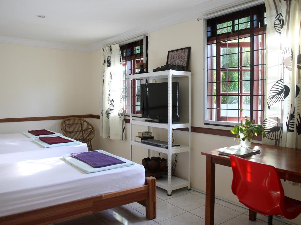 Morning Glory Guest House Кучінг Номер фото
