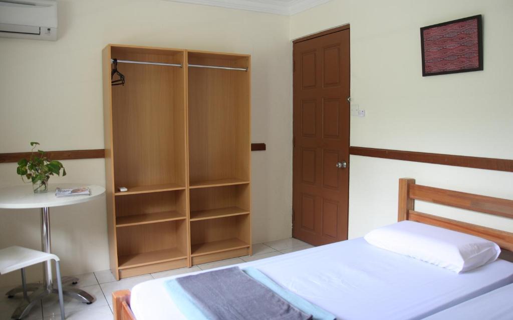 Morning Glory Guest House Кучінг Номер фото
